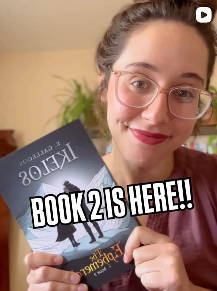 Instagram post: Erica holding a copy of Ikelos, captioned Book 2 is here!